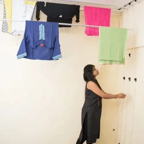 Pulley Clothes Hanger 1 Indoor pulley-operated drying rack installed in a modern balcony